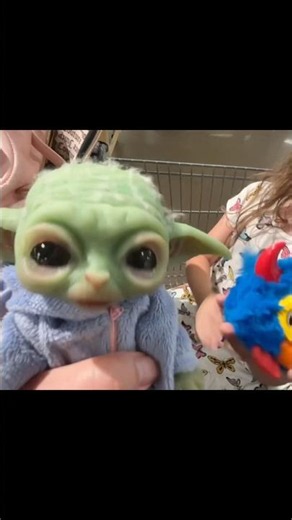 Baby Yoda meets a party rocker