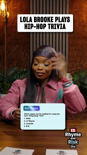 XXL on Instagram: "Lola Brooke puts her hip-hop IQ to the test in XXL’s Rhyme and Risk presented by Stake 😭 Play along as the Brooklyn rapper takes on rapid rounds of rap trivia! Think you can beat her score? 👀 Hit @xxl link in bio to watch the full video. 🔗 Sponsored by @stake"