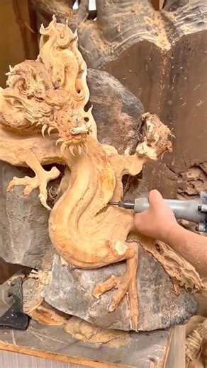Detailed Wood Carving of a Dragon Sculpture Crafted with Precision and Artistic Skill