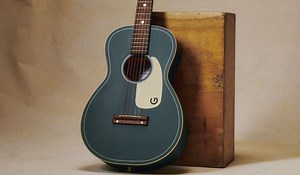 Gretsch graces its ultra-affordable G9500 Jim Dandy acoustic guitar with a limited-edition Nocturne Blue finish