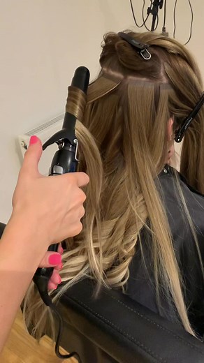 Achieve Perfect Beach Waves with Tape-in Hair Extensions | Babyliss Pro Curling Iron