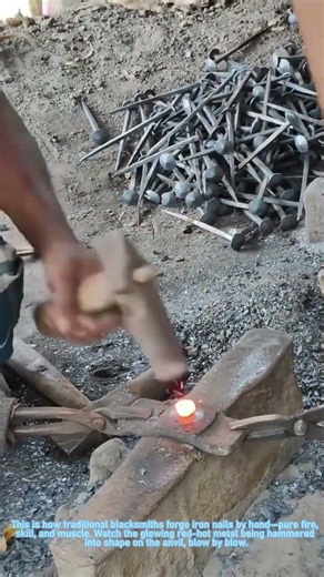 Hand-forging iron nails the old-school way! 🔥🔨