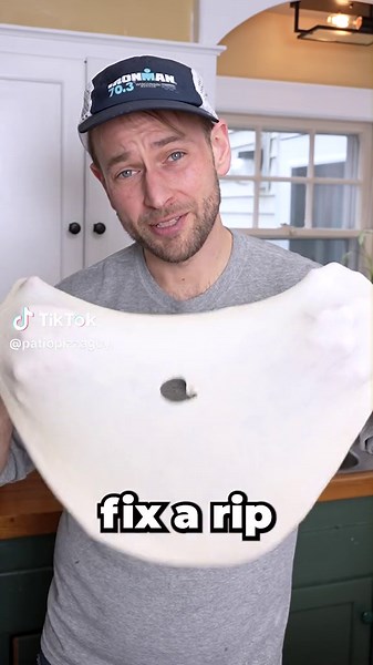 Fixing a tear in #pizza #pizzadough #pizzaislife #pizzarecipe #pizzaideas