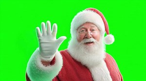 Download Happy santa claus waving hello on a green screen background for free