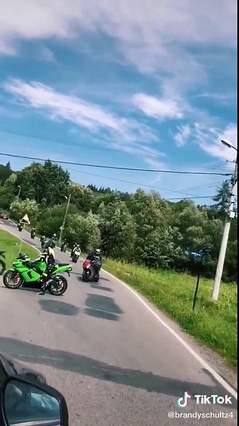 Group of Motorcyclists Explore Scenic Winding Roads