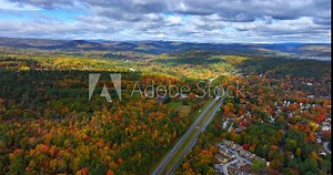 Amazing scenery of Vermont, New England, USA in autumn. Two parallel highways cross the wooded landscape. Aerial perspective.