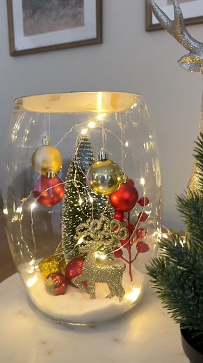 Bring the magic of Christmas right into your home with this easy DIY centerpiece 🎄💫 All you need is a glass vase, some ornaments, fairy lights, and a touch of creativity! Perfect for your living room, dining table, or any cozy corner ✨❤️ Would you try this idea for your home? 🎁 #Hashtags: #ChristmasDIY #HomeDecorIdeas #HolidayVibes #FestiveDecor #DIYChristmasDecor #CreativeIdeas #ChristmasCrafts #HomeStyling #ChristmasDecoration #DecorWithSandy | Decorate with me
