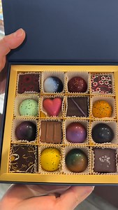 Looking for a beautiful, elegant, and memorable gift box? ✨ Our chocolate gift boxes are the perfect choice—fully customizable to suit every taste and occasion. Choose from our award-winning and best-selling bonbons and squared pralines, or go all-bonbons or all-pralines if you prefer. Available in 16-piece, 9-piece, and 5-piece options, each box is crafted from luxurious rigid material with a magnetic closure, finished in an elegant navy blue with our gold-stamped logo, and tied with a satin ri