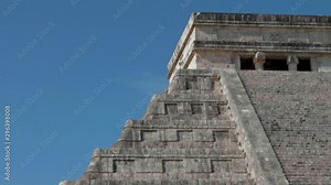 Ancient Aztec temple pyramids, historic Mexican building, tilt down
