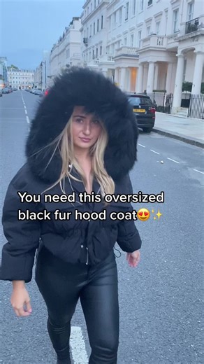 Stylish Black Oversized Fur Hood Coat for Fashion Enthusiasts