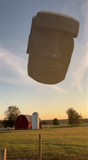 The Floating Head Drifts Over Farm