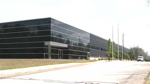 Crowd packs City Hall in Nashua, pushing back against sale of property to Chinese company