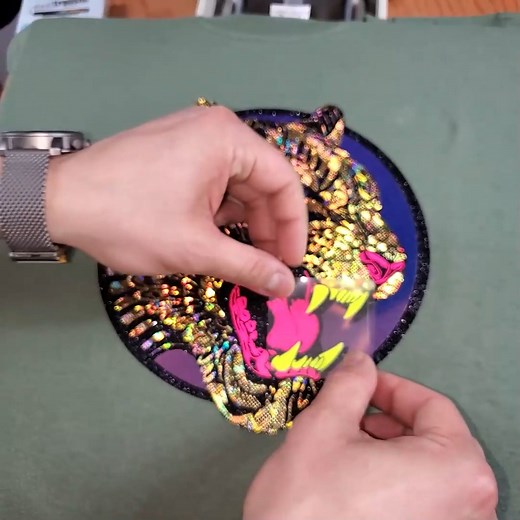 ✨ Crafting Tip Alert! ✨ We're layering our embossed, glitter, and spectrum HTV for a stunning effect! Here's how we do it: 1️⃣ Press each layer for 2-3 seconds. 2️⃣ Finish with a final seal for 10 seconds. Perfect for a professional and lasting finish on all your projects! | heattransfersource.com