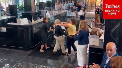 Laid-Off State Department Employees Receive Applause As They Leave The Building