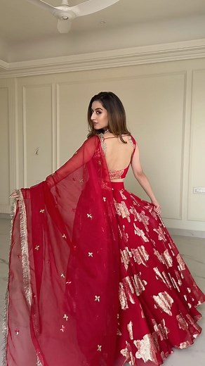 Draped in Red Splendor, Dancing to the Rhythm of Bollywood Beats ❤️ Visit the website (www.bunaai.com) to shop the outfit now. [ Bunaai, Indian wear, Ethnic Wear suit, Traditional, Indian outfit, Celebrity approved fashion, Content creator, Fashion influencer, Wedding outfit ] #bunaai #indianwear #ethnicwear #westernwear #fusionwear #indowestern | Bunaai