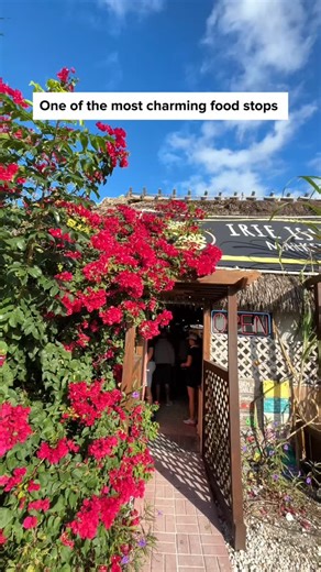 Kate | Travel & Adventure Family on Instagram: "Farm-to-table island cooking in the Florida Keys 🌴 This is Irie Island Eats in Marathon, and it’s such a good stop if you love fresh, simple food done right. They focus on local products, clean ingredients, and responsible eating…bringing food prep back to the old-school island days. Everything is made with fresh fruits, vegetables, and herbs, and cooked over a wood fire, which you can really taste. The setup is part of the charm: two food trucks 