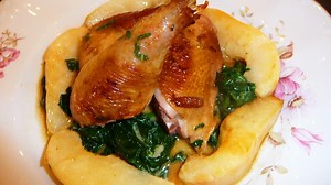 Roast guinea fowl with spinach and pears
