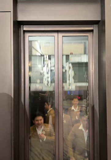 Synchronized Dance Routine in Elevator