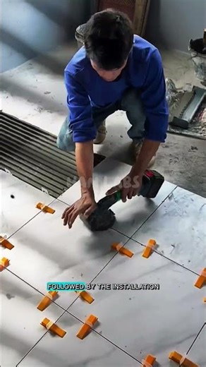 the secret of professional builders in installing large ceramic tiles. #shorts #construction #fyp