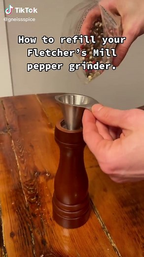 Refilling my pepper mill using my favorite funnel! #kitchentips #spices #howto #fletchersmill #organicspices #gneissspice