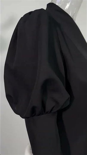 Audrey Hepburn style black short A line dress with V neck and puff sleeves