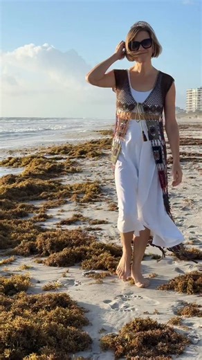 For layering queens: Fringed Maxi Vest Crochet Pattern (OutstandingCrochet.com via link in profile) We finally have a manageable breeze after two weeks of relentless northeast winds — and I can wear crochet on my morning walk again! #outstandingcrochet #crochettop #crichetcardigan #crochetvest #crochetpattern #crochetlace | Outstanding Crochet