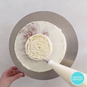 You don't need to be a cake-making pro to master this ruffled look — it's actually quite easy! Try it using our recipe for carrot cake with white-chocolate frosting: http://martha.ms/61898ePCH | Martha Stewart