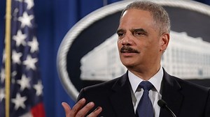 Holder: Ferguson police shooting suspect a 'damn punk'