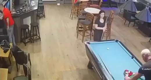The reposne was to HIT his wife with a pool stick first and then punch the guy? Worst part is if the guy dies he will face manslaugter charges.