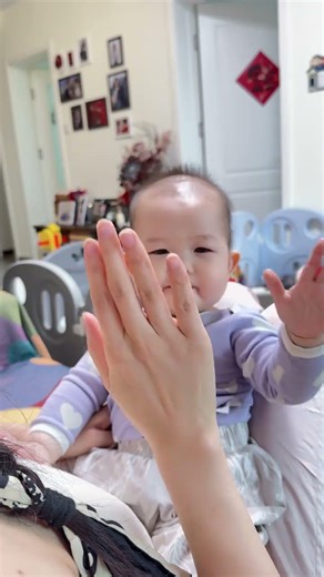 10-Month-Old Master: Distinguishing Handshake from Clasp