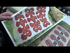 Hand-knotting a rug