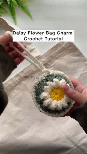 Mushyy | Crochet Patterns & Tutorials on Instagram: "Daisy Flower Bag Charm Crochet Tutorial ✨ I made the cutest little crochet project and I’m low-key obsessed😍 This crochet daisy AirPod case bag charm pattern is such a quick, beginner-friendly make and it’s actually so practical. You can clip it onto your tote, backpack, or purse and keep your AirPods safe in the sweetest mini crochet flower pouch. Cute and functional is my favorite combo.💕 If you love easy crochet patterns, crochet flower t