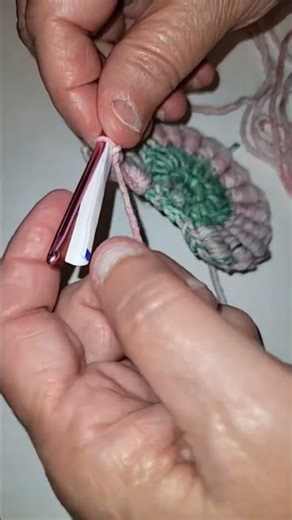 Extra apparatus to make crochet bullion stitch using rolled cardboard tip