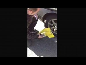 Andrew demonstrates how to remove a boot from your vehicle