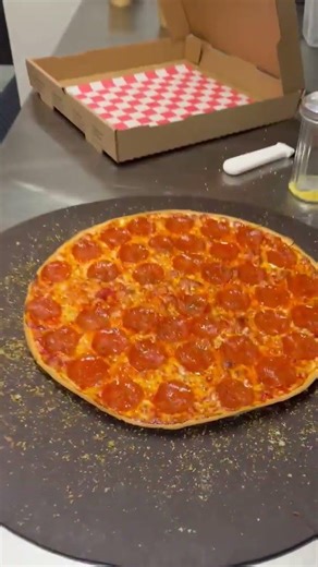 Pizza girl Saturday action just getting started. She’s running these ovens all night.