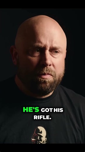 Fingers Bloodied: Marine Pinned Down After Grenade Blast in Fallujah.