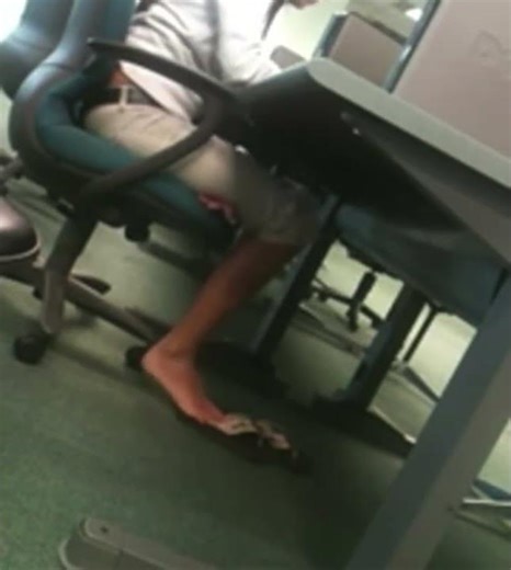 Candid feet in computer lab