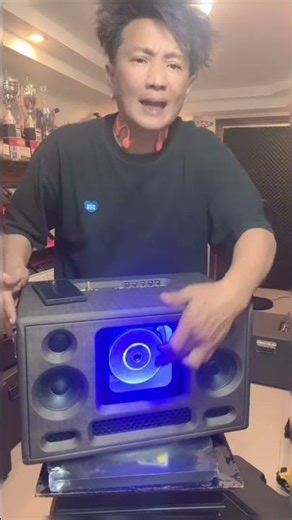 DIY Bluetooth speaker enclosure with 6.5-inch bandpass subwoofer, built-in sound.