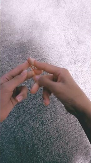 How to tie a knot on small rubber band