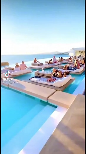 Luxurious Poolside Relaxation and Scenic City Views