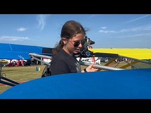 14 year old Alina preflights her Aerolite Ultralight at Oshkosh