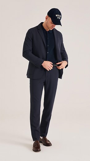 Classic styles updated for the modern wardrobe - that’s the DNA of Wolsey. Our technical blazer, crafted from premium stretch fabric, blends timeless elegance with contemporary comfort. Pair with matching trousers for the perfect smart-casual look. | Wolsey