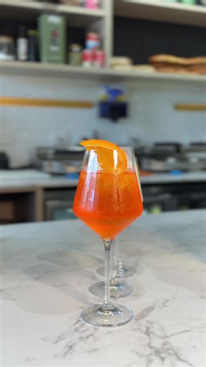 Kick Off Summer with Mordi's New Hours and Spritzes!