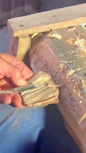 cutting a large wooden log using a professional band saw machine to create a unique art masterpiece