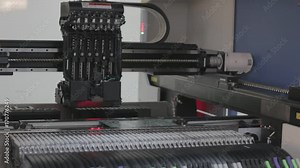 Automated Electronic circuit board line production. Machine Produces Printed digital board, preparing for work. Manufacture of electronic chips. Robotic arm. Red light. High-tech. Full HD Stock Video