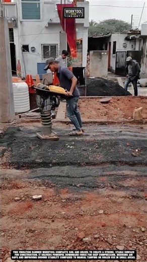 Compacting soil surface using vibration rammer for construction worktool