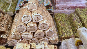 Download Assorted traditional sweets arranged for sale at market for free