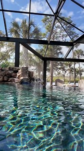 16K views · 372 reactions | Pool cages can turn your backyard into an extension of your house, keeping bugs away and leaves out of your pool. This project features natural rock waterfalls, a beautiful spa, an infinity edge, and a massive pool cage. #insanepools #lucaslagoons #backyardgoals | Lucas Lagoons | Facebook