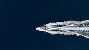 clip-3605570371-aerial-overhead-view-rib-boat-outboard-engine