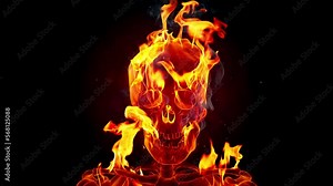 Burning skull on a black background. Slow motion fire flames with sparks.